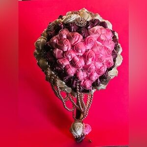 Handmade bouquets for the bride, paired with a boutonnière for the groom.